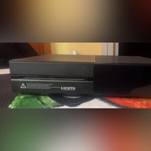 Xbox console with four games and controller included